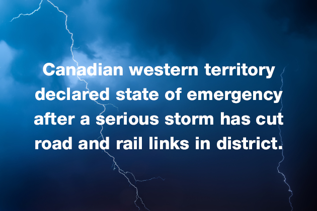 Canadian western territory declared state of emergency after a serious storm has cut road and rail links in district.